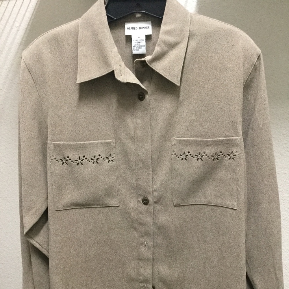 Woman’s tan jacket